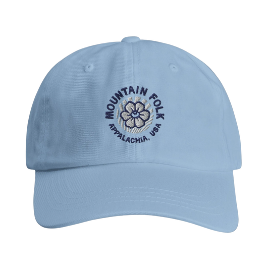 A light blue cap with an embroidered 'Mountain FOLK Appalachia USA' logo on the front.